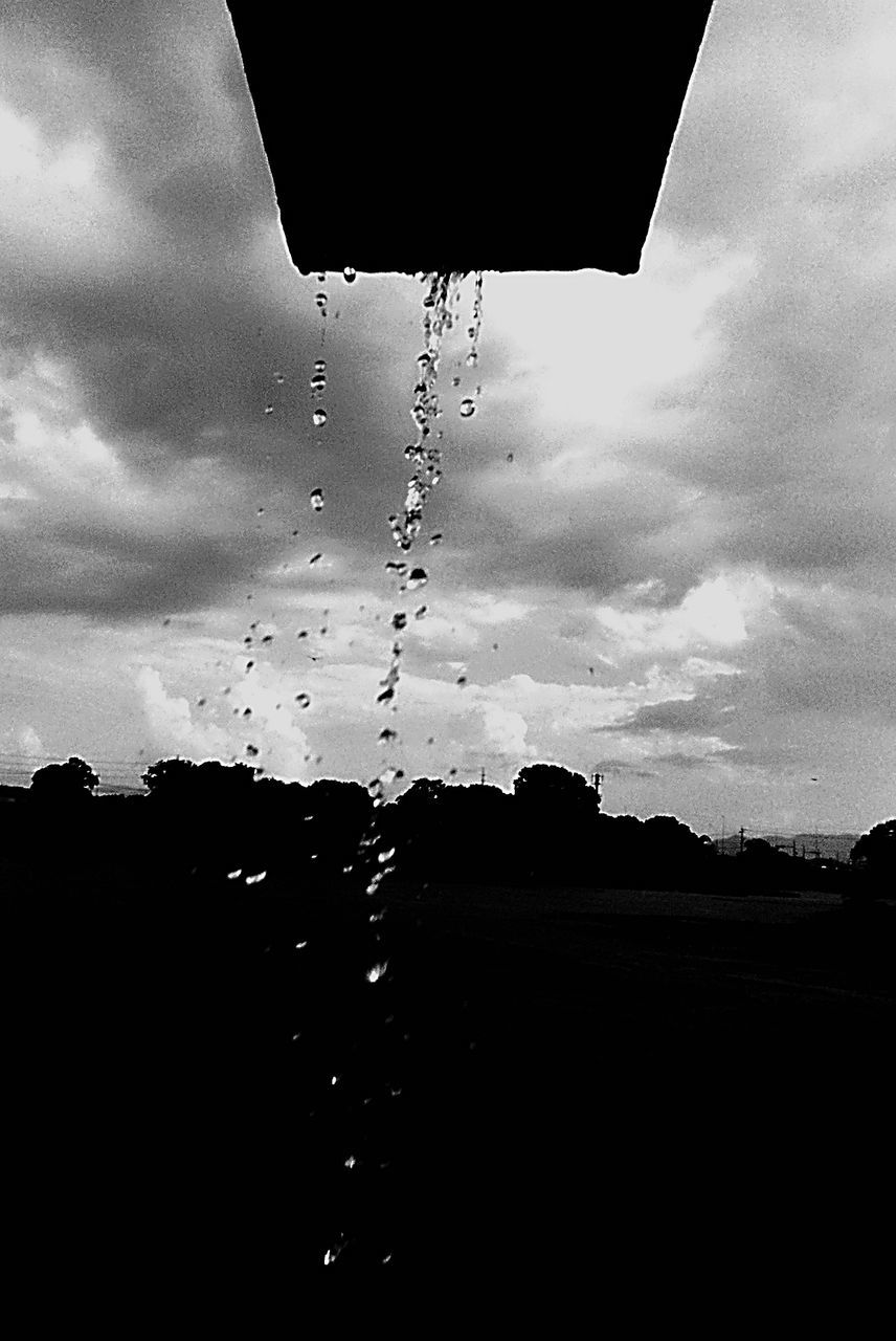 sky, silhouette, cloud - sky, building exterior, architecture, built structure, window, weather, cloudy, low angle view, cloud, dusk, house, rain, wet, power line, no people, building, sunset, overcast