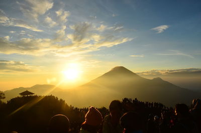 Scenic view of mountains against sky during sunset