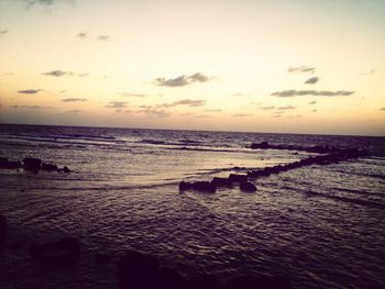 Scenic view of sea at sunset