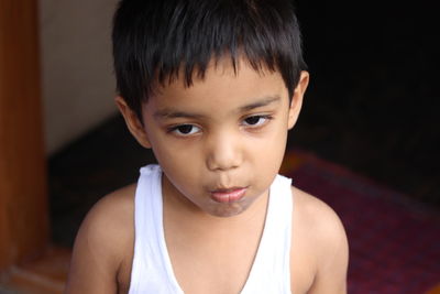 Close-up of boy at home