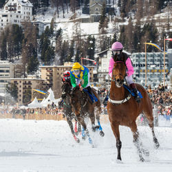 Man riding horse in winter