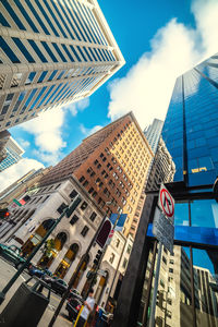 Low angle view of modern buildings against sky