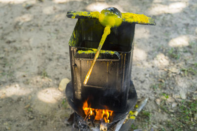 Close-up of fire on barbecue grill