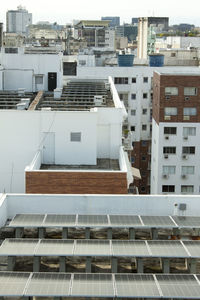 Solar panels installed on the terrace of a residential condominium