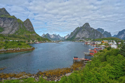 Scenic view of sea against mountain range