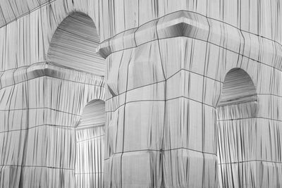 Details of the arc de triomphe wrapped by christo and jeanne-claude in paris in september of 2021