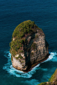 High angle view of rock formation in sea