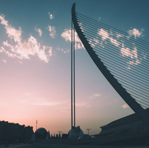 Low angle view of silhouette buildings against sky during sunset