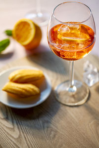 Aperol spritz with delicious madeleins