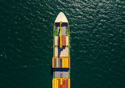 High angle view of ship sailing in sea