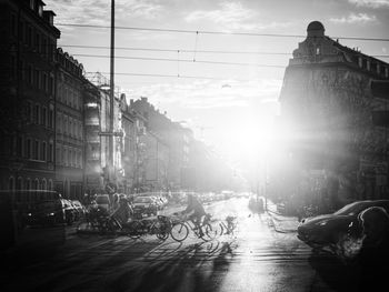 People riding bicycle on city street