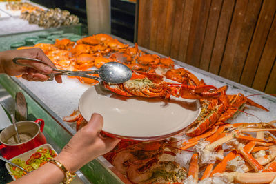 High angle view of hand holding food