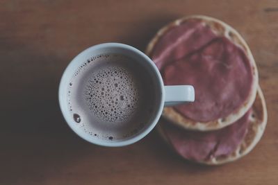 Close-up of drink with breakfast on table