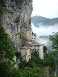 View of buildings on sheer cliff