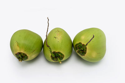 High angle view of fruits against white background