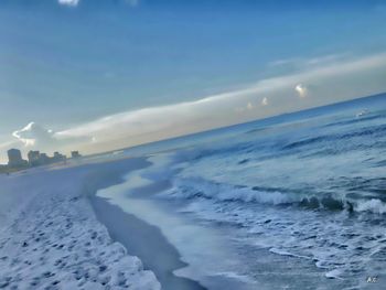 Scenic view of sea against sky during winter