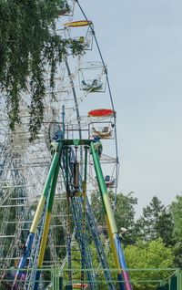 Low angle view of ski lift against sky