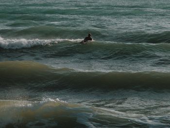 Man surfing in sea