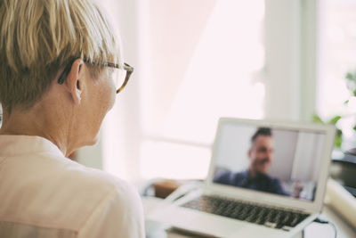 Woman having a video conference call