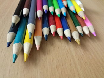 High angle view of colored pencils on table