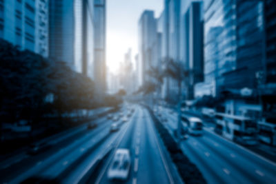 Railroad tracks amidst buildings in city