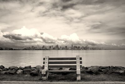 Pier over lake against sky