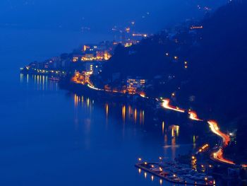 Aerial view of illuminated city at night