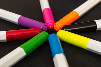 Close-up of colored pencils on table