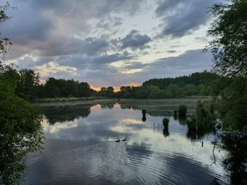 Scenic view of lake against sky during sunset