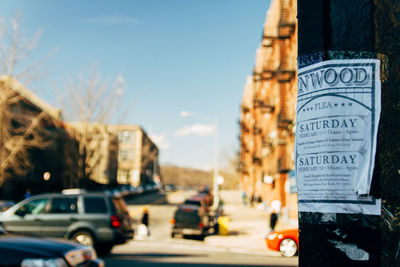 Vehicles on road along buildings