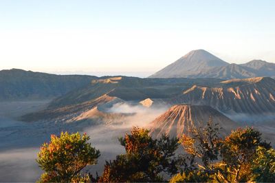 Scenic view of volcanic crater against sky