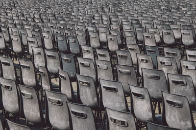 Full frame of empty chairs in square