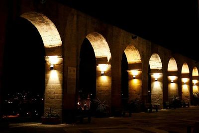 Illuminated building at night