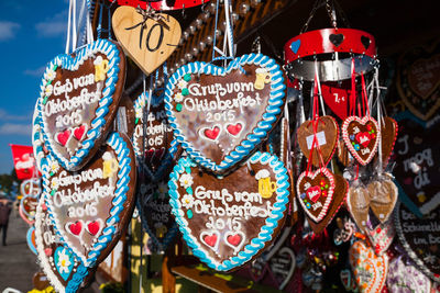 Close-up of heart shape hanging on market stall