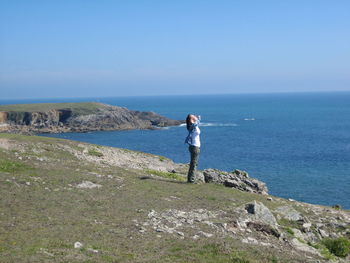 Happy woman on shore