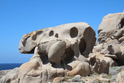 Close-up of statue against clear blue sky