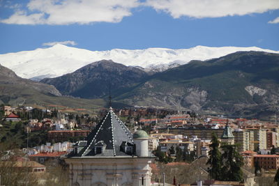 High angle view of town against mountains