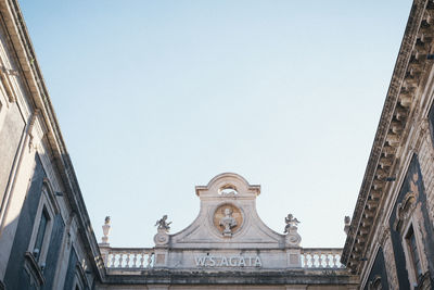 Low angle view of historic building against clear sky