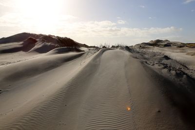 Panoramic view of desert against sky