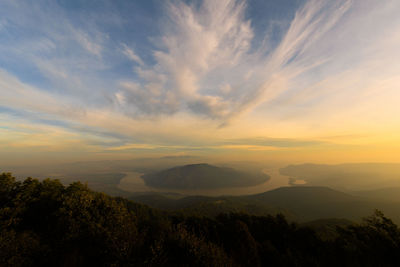 Scenic view of dramatic sky over landscape