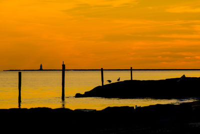 Scenic view of sea at sunset