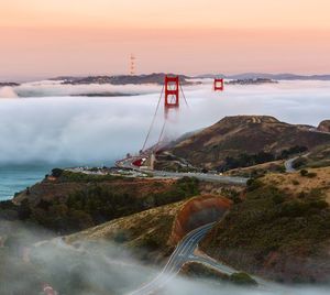 Golden gate bridge against sky in foggy weather