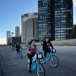 People riding bicycle in city