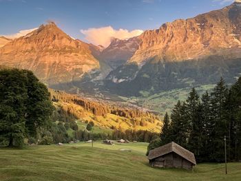 Scenic view of landscape and mountains against sky