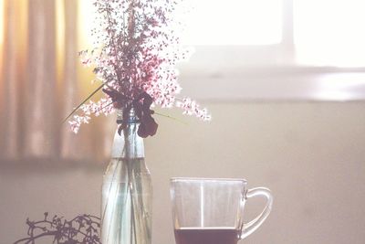 Close-up of flower vase on table