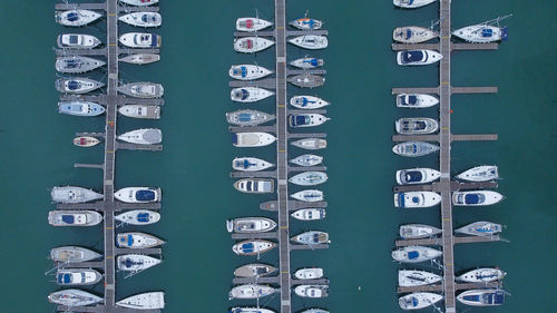 Aerial view of boats moored at harbor