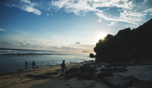 Scenic view of sea against cloudy sky