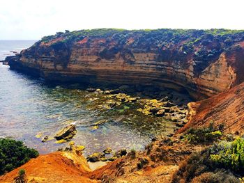 View of rock formations at seaside