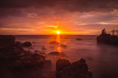 Scenic view of sea against sky during sunset