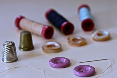 High angle view of various buttons on table